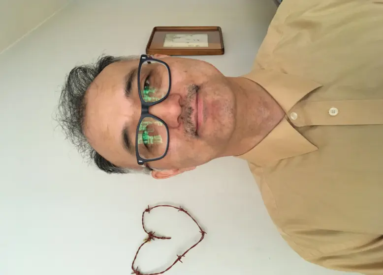 Kuvassa on Ken Takaki