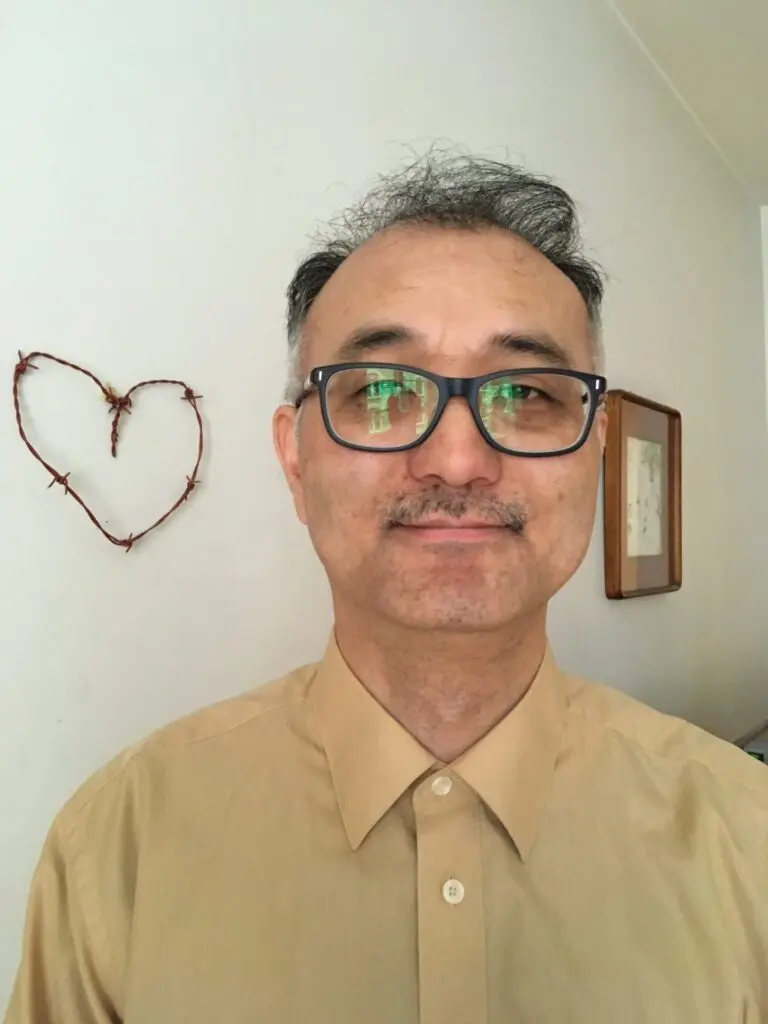 Kuvassa on Ken Takaki